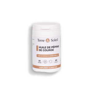 Pilulier de complément alimentaire huile de pépins de courge Terre & Soleil sur fond de graines
