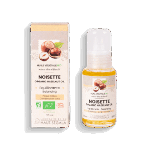 Flacon et étui d'huile végétale de noisette biologique Laboratoire Haut-Ségala. Le produit de 50 ml est un soin équilibrant pour les peaux mixtes, certifié bio Ecocert.